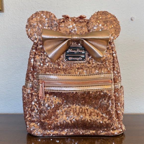 Loungefly Handbags - Disney Parks Loungefly Rose Gold Sequin Mini Backpack Vintage Heart Logo